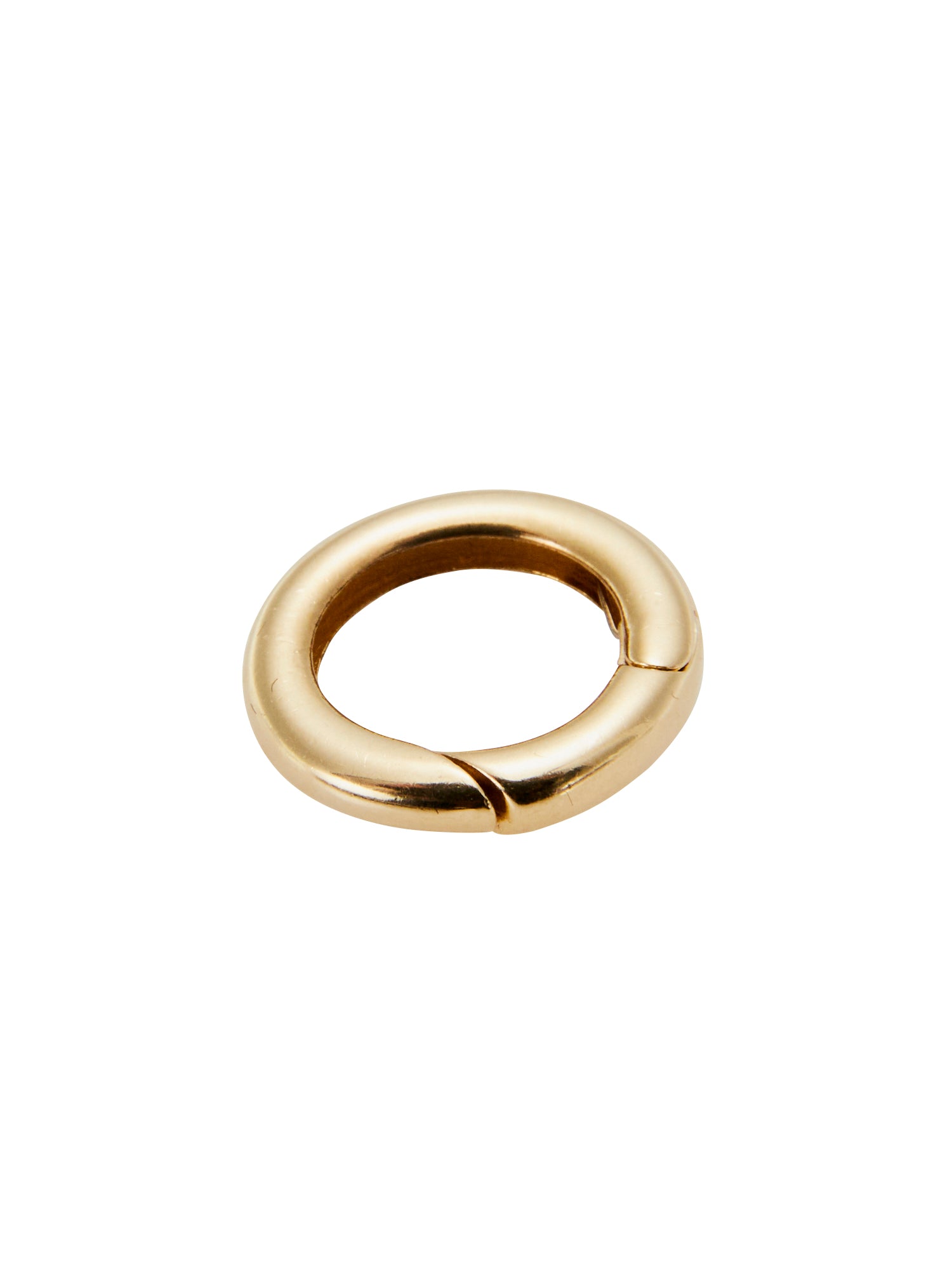 Gold spring ring enhancer from Jeuje Fine Jewelry on a white background