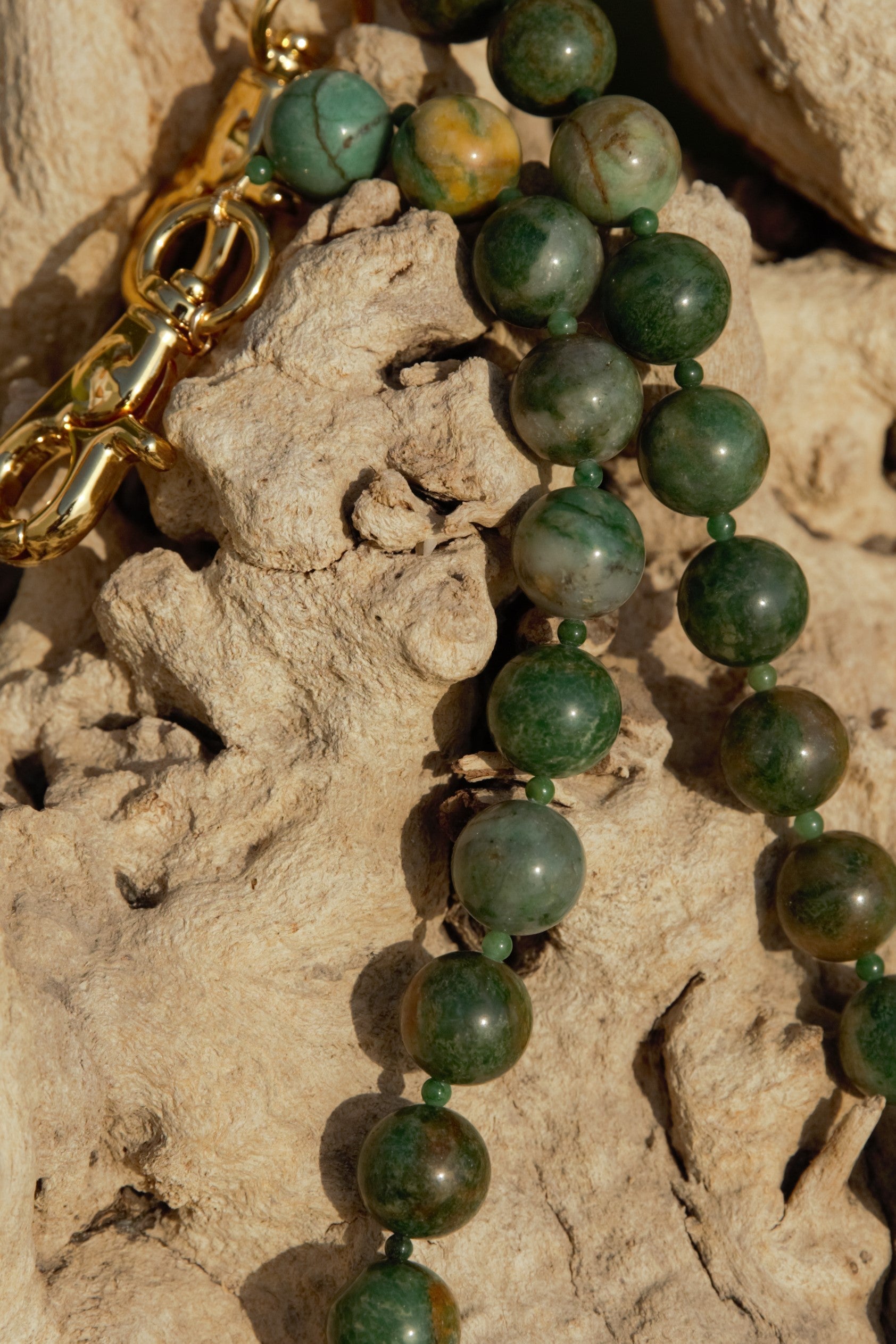 African jade strand with gold clasps