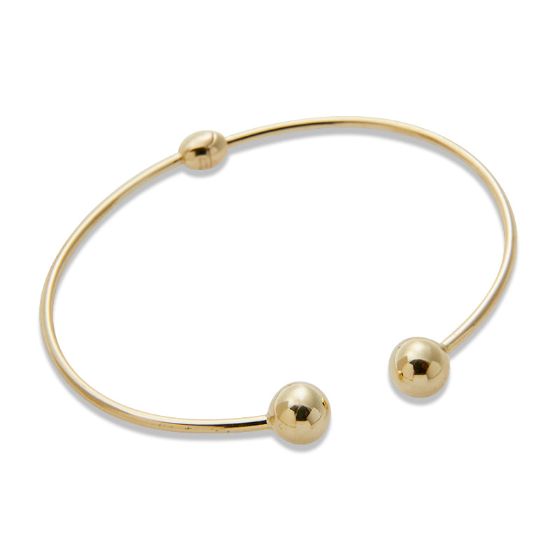 The Ball Cuff from Jeuje Fine Jewelry on a white background