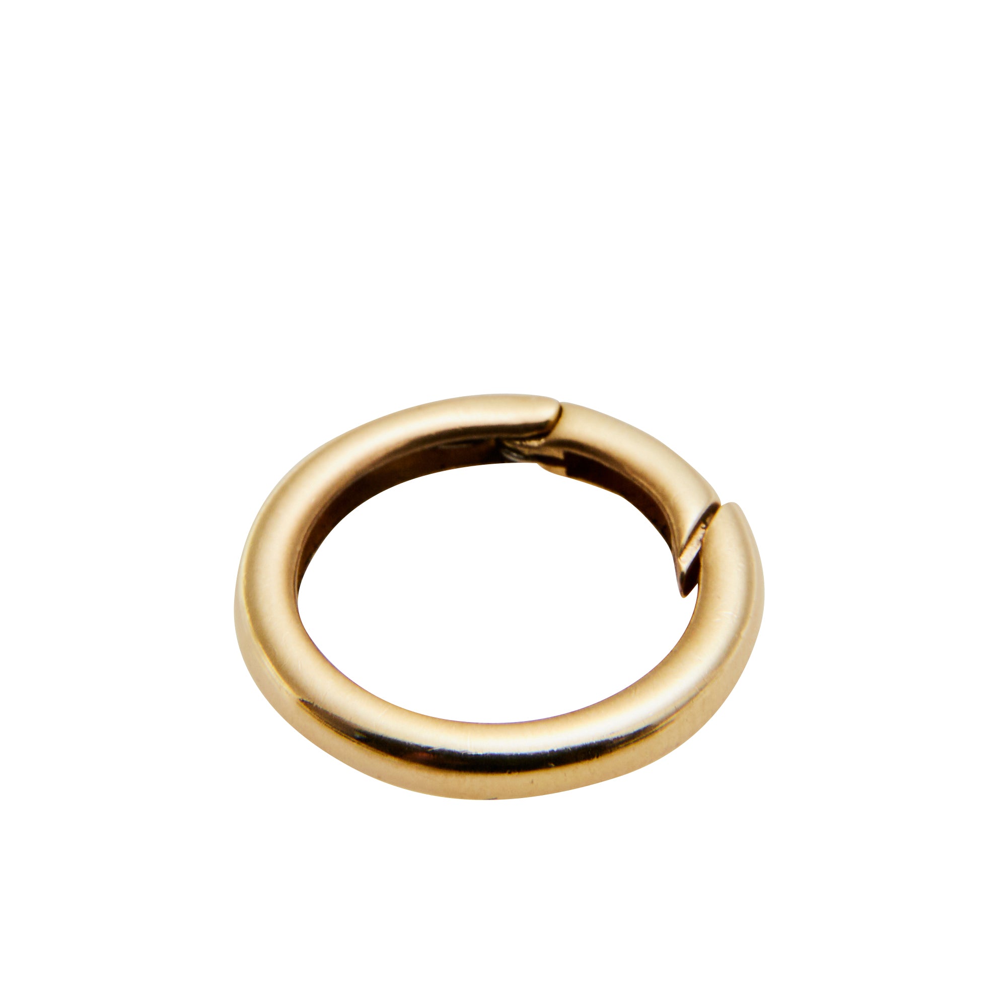 Gold round push lock enhancer from Jeuje Fine Jewelry on a white background