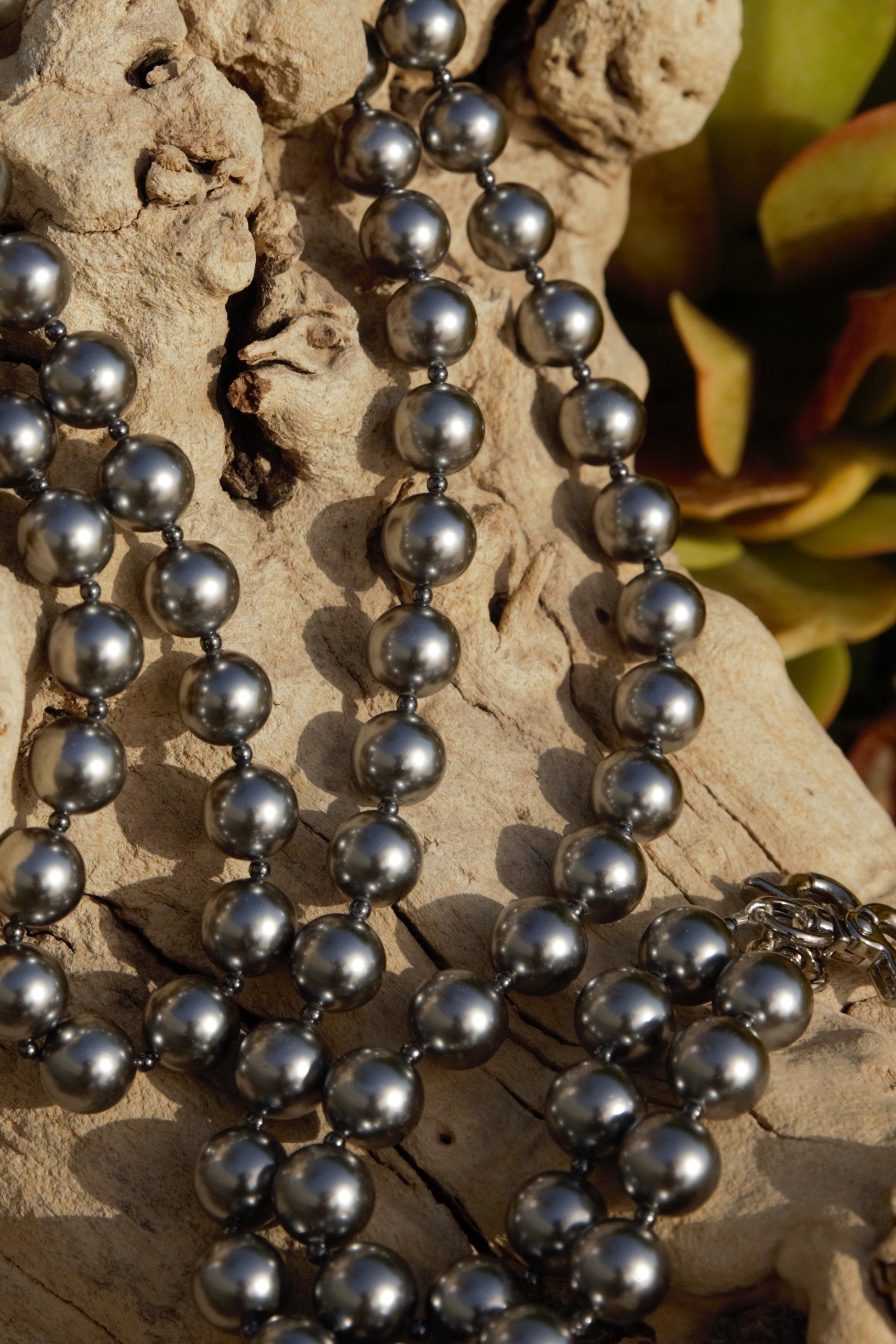 Dark grey pearl strand with silver clasps