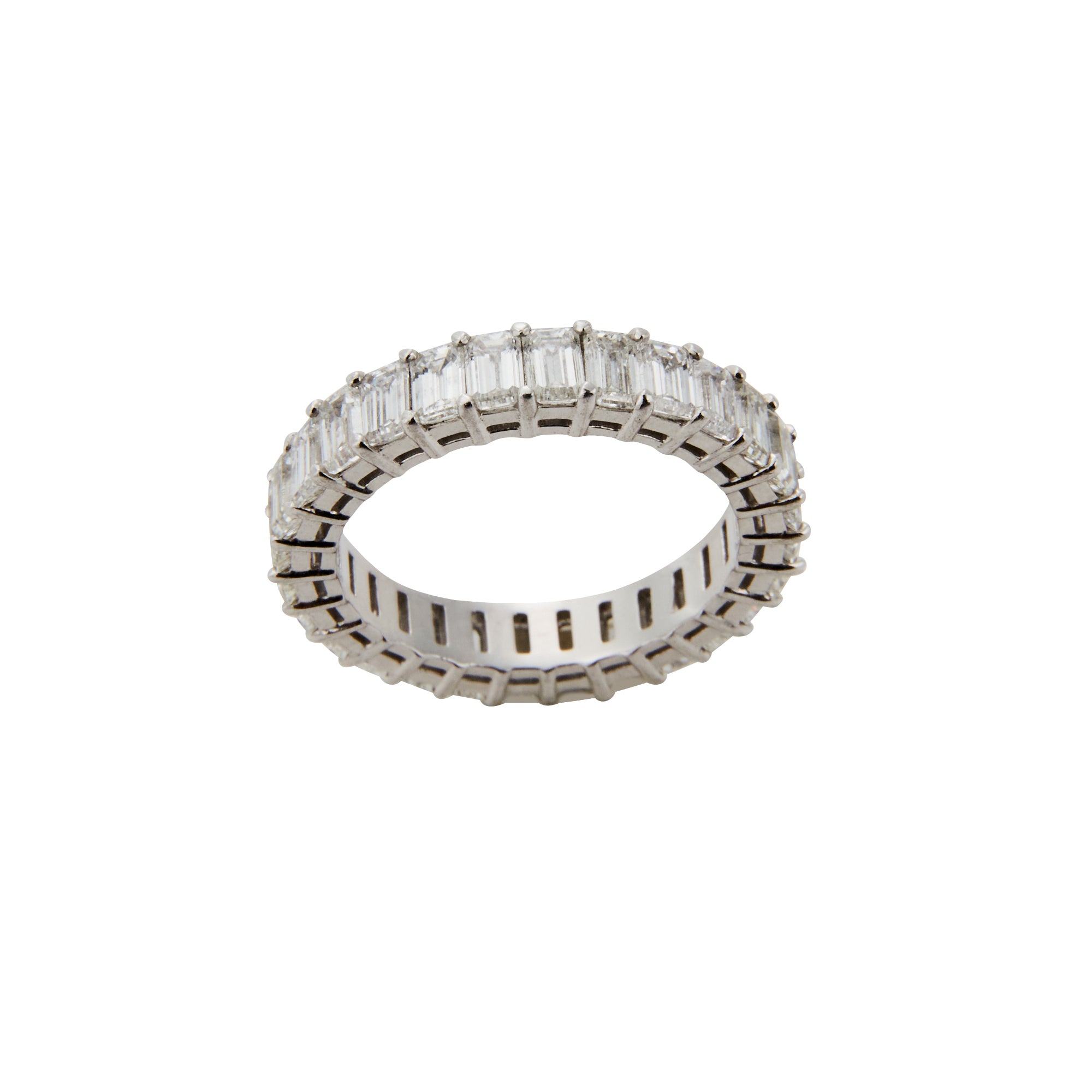 Emerald cut diamond eternity band from Jeuje Fine Jewelry on a white background