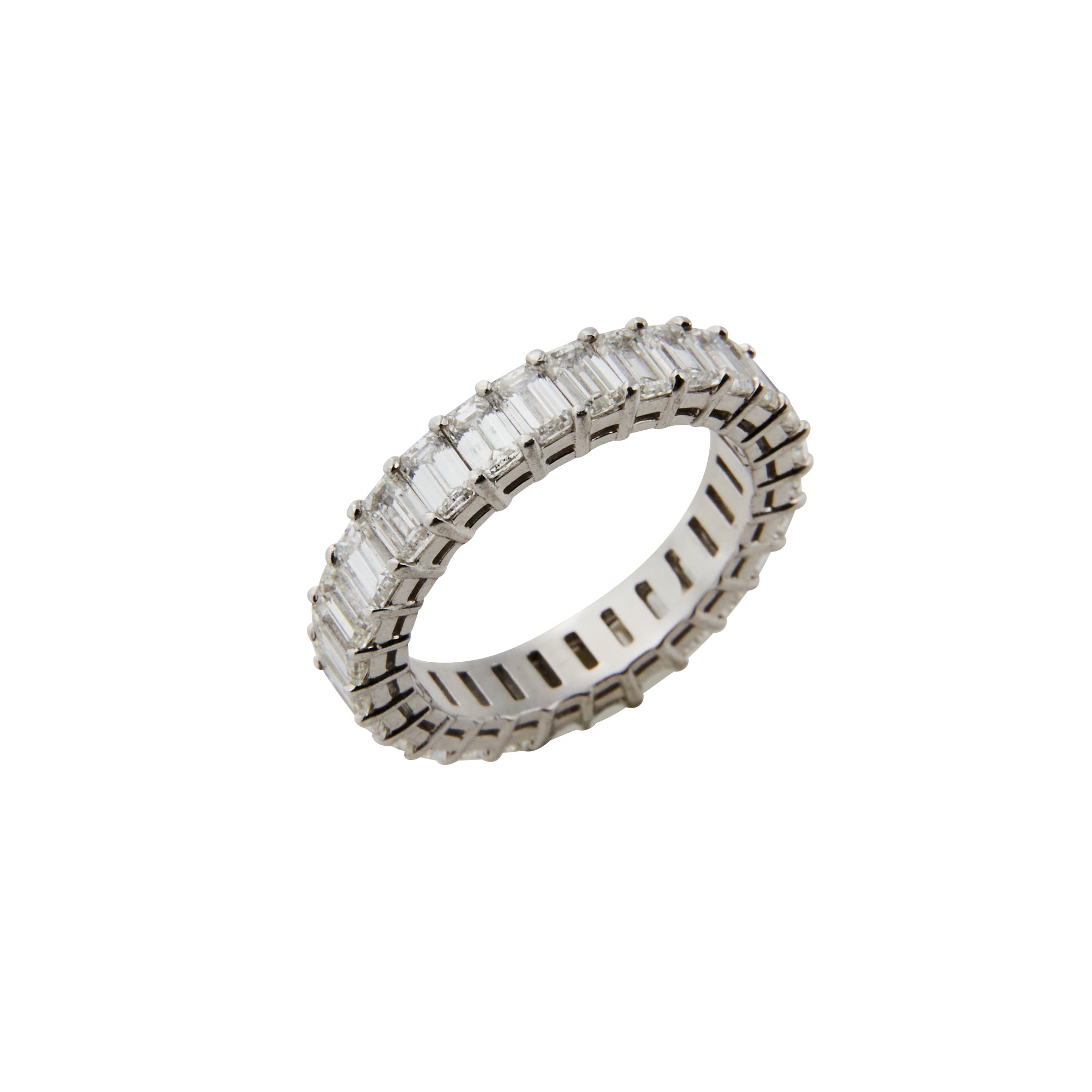 Emerald cut diamond eternity band from Jeuje Fine Jewelry on a white background