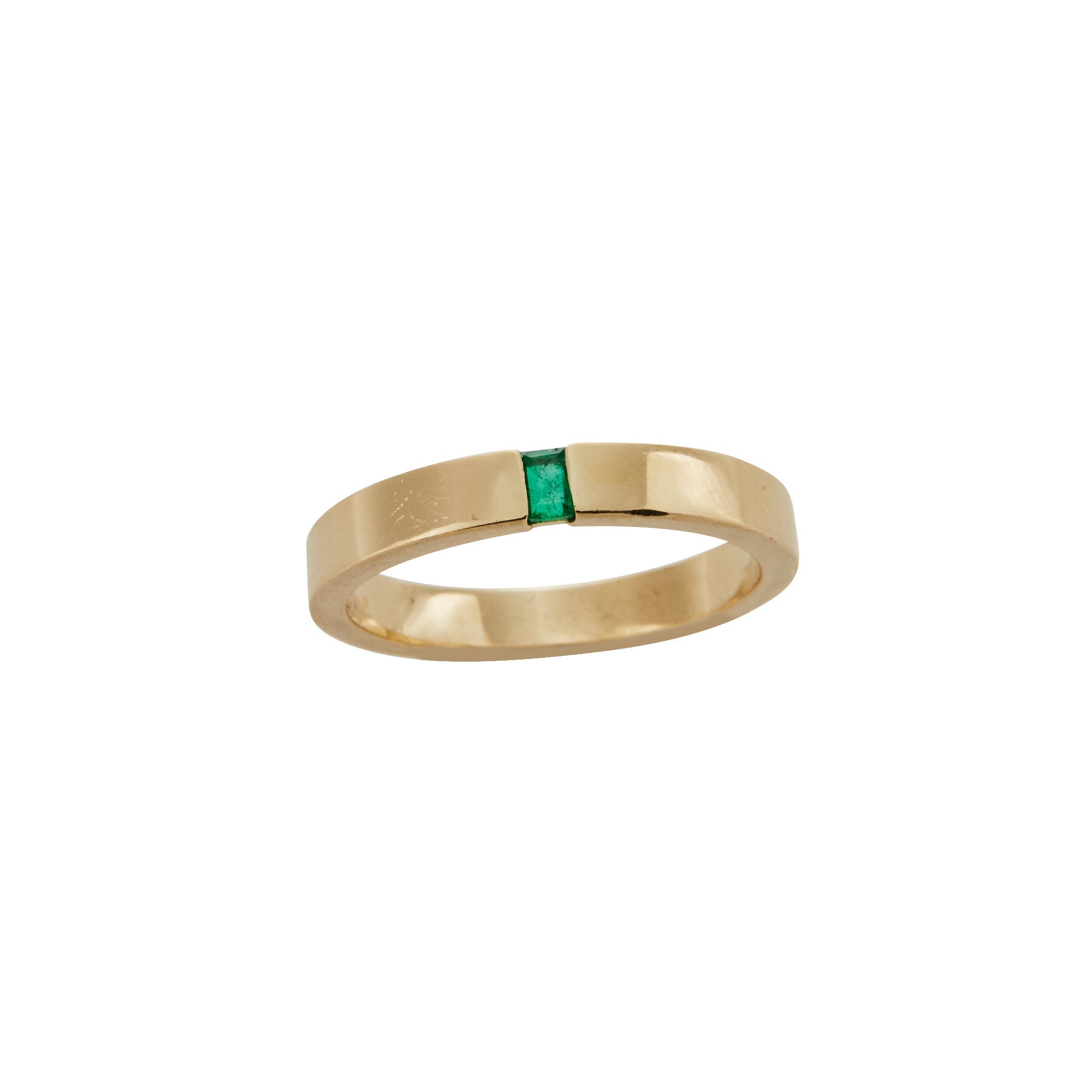 Emerald stacking ring from Jeuje Fine Jewelry on a white background