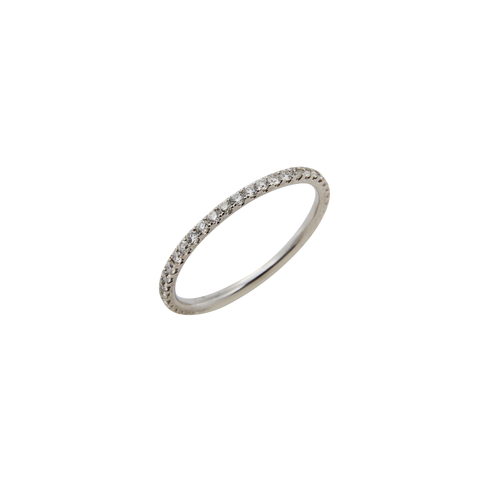 Extra dainty diamond band from Jeuje Fine Jewelry on a white background