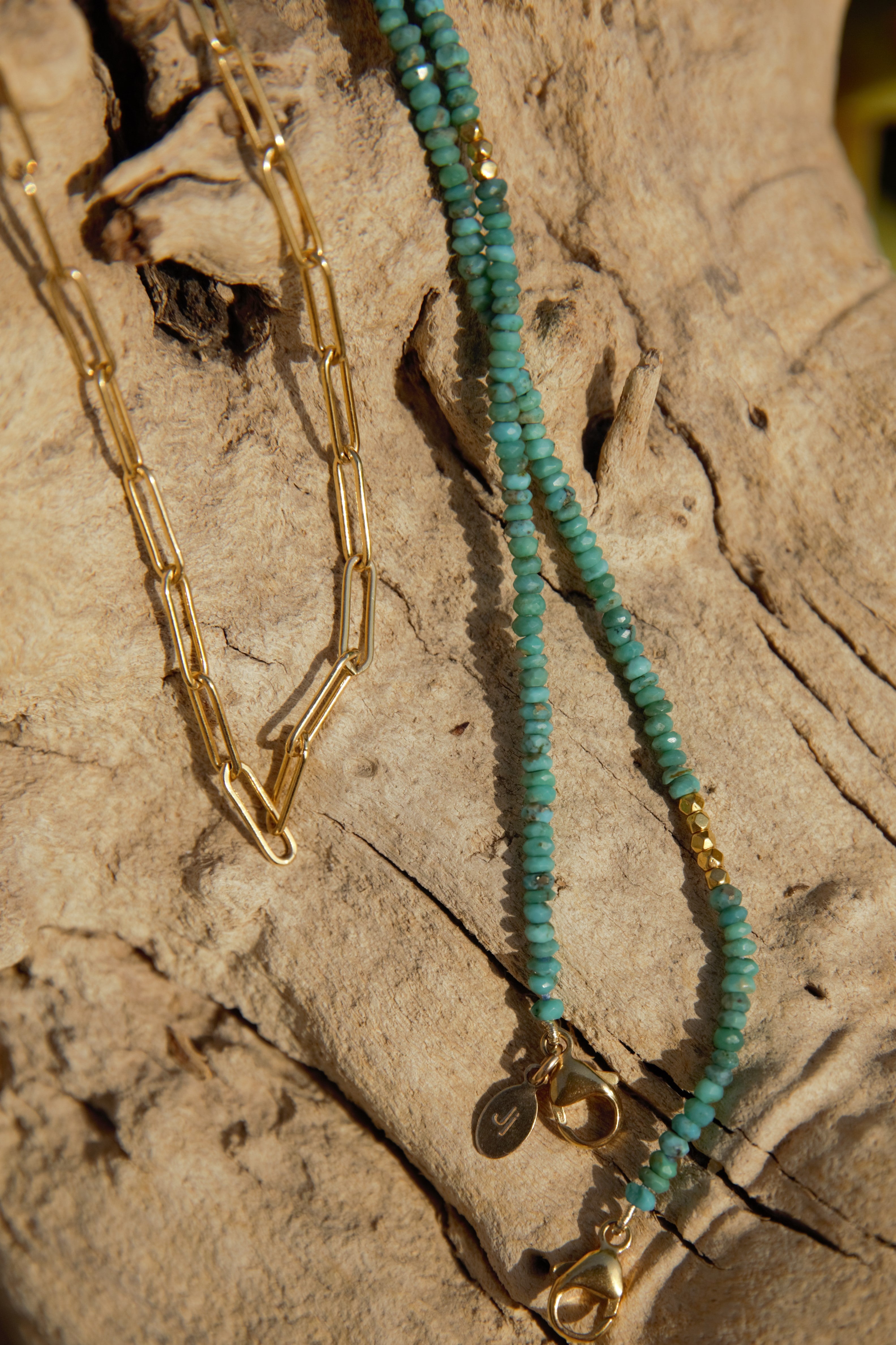 Raw turquoise eyeglass necklace with 18k gold beads and gold-filled paperclip chain