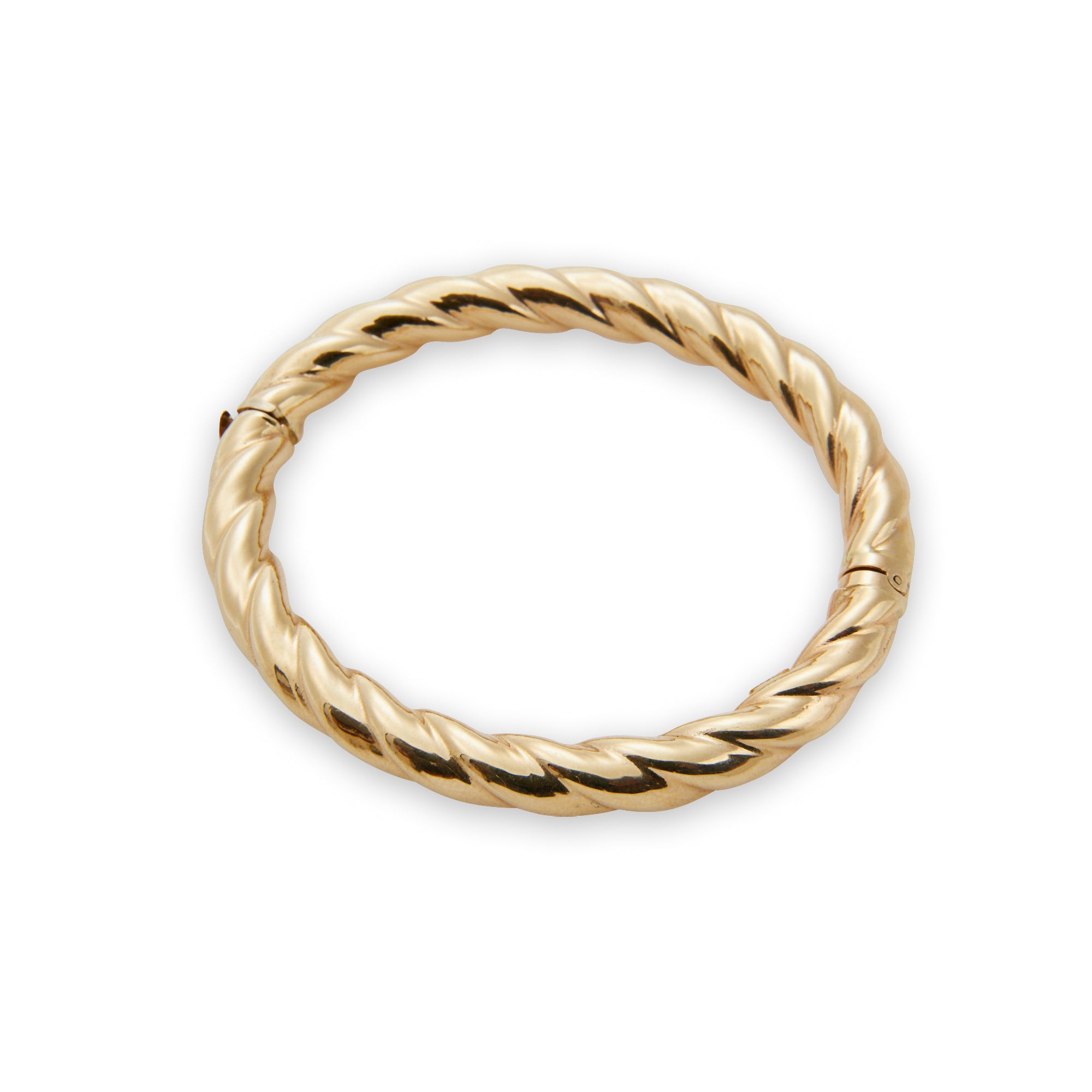 The Gold Twist Bangle from Jeuje Fine Jewelry on a white background