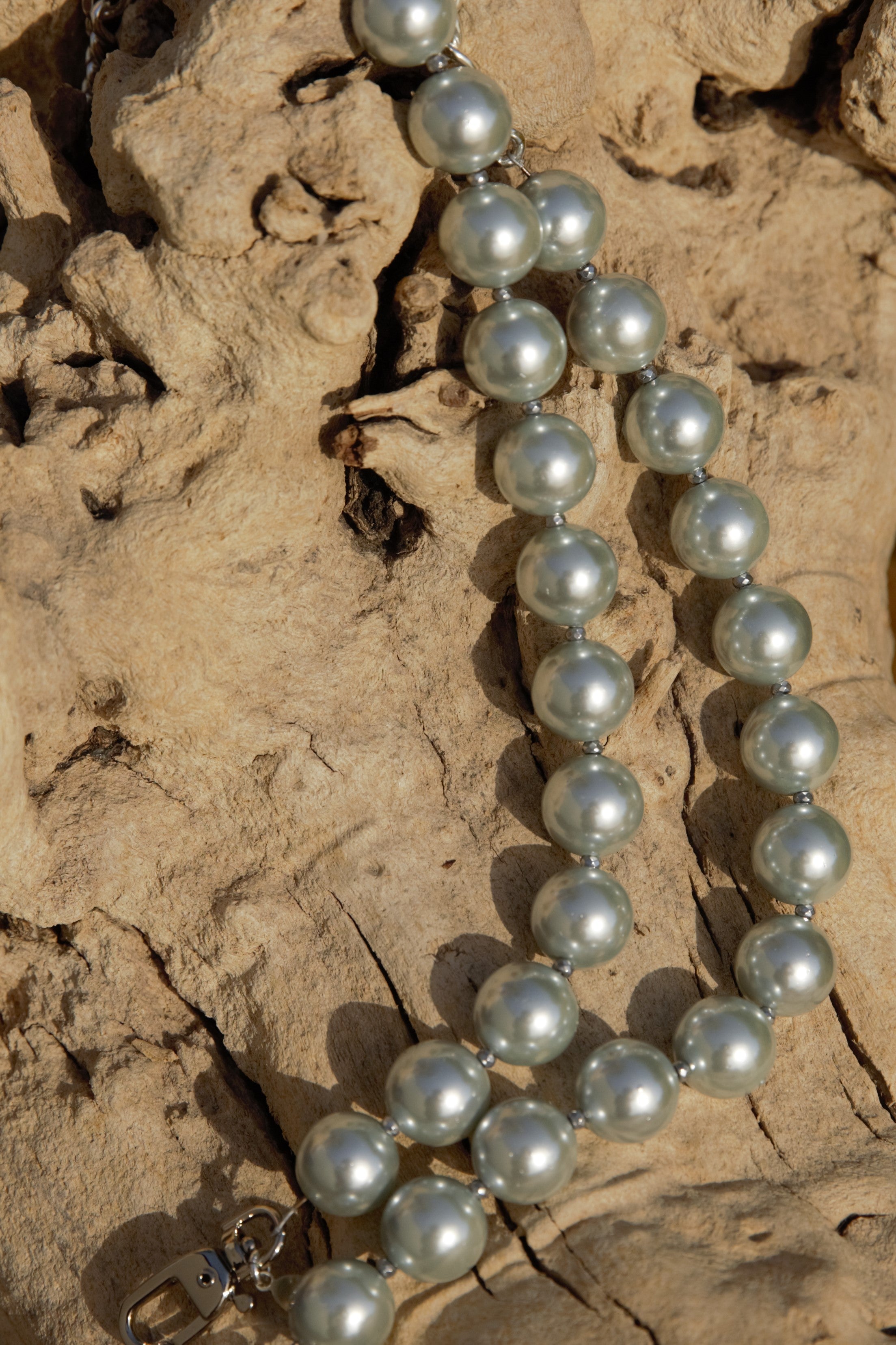 Grey pearls strand with silver clasps