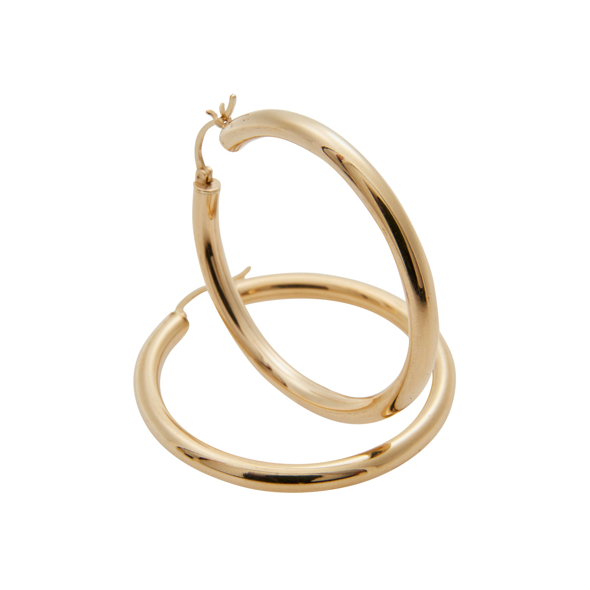 Large gold hoops from Jeuje Fine Jewelry on a white background