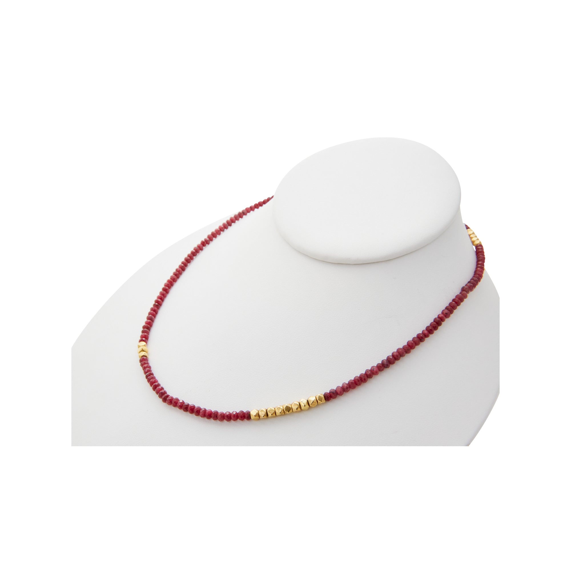 Raw ruby necklace from Jeuje Fine Jewelry on a white background