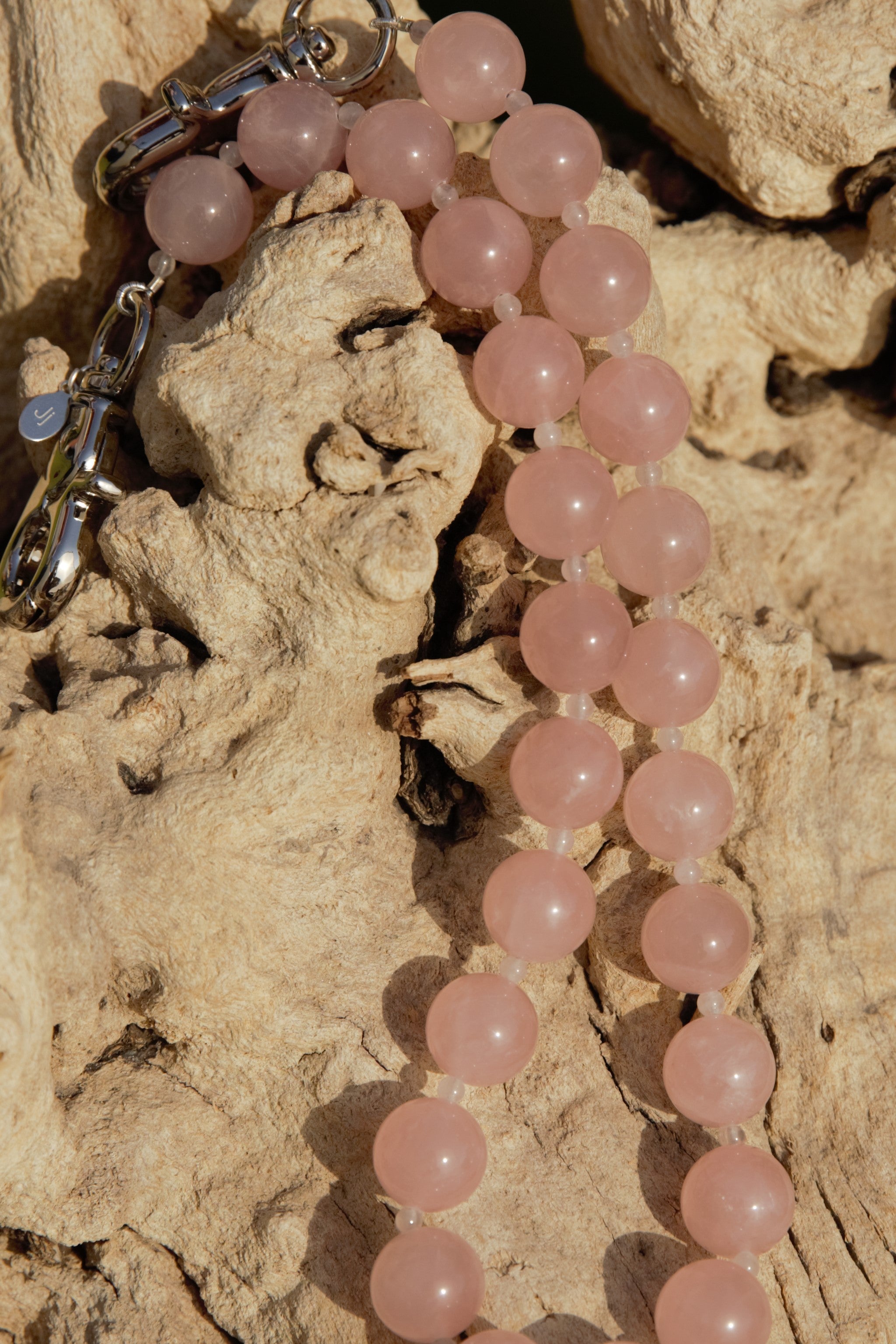 Rose quartz with silver clasps