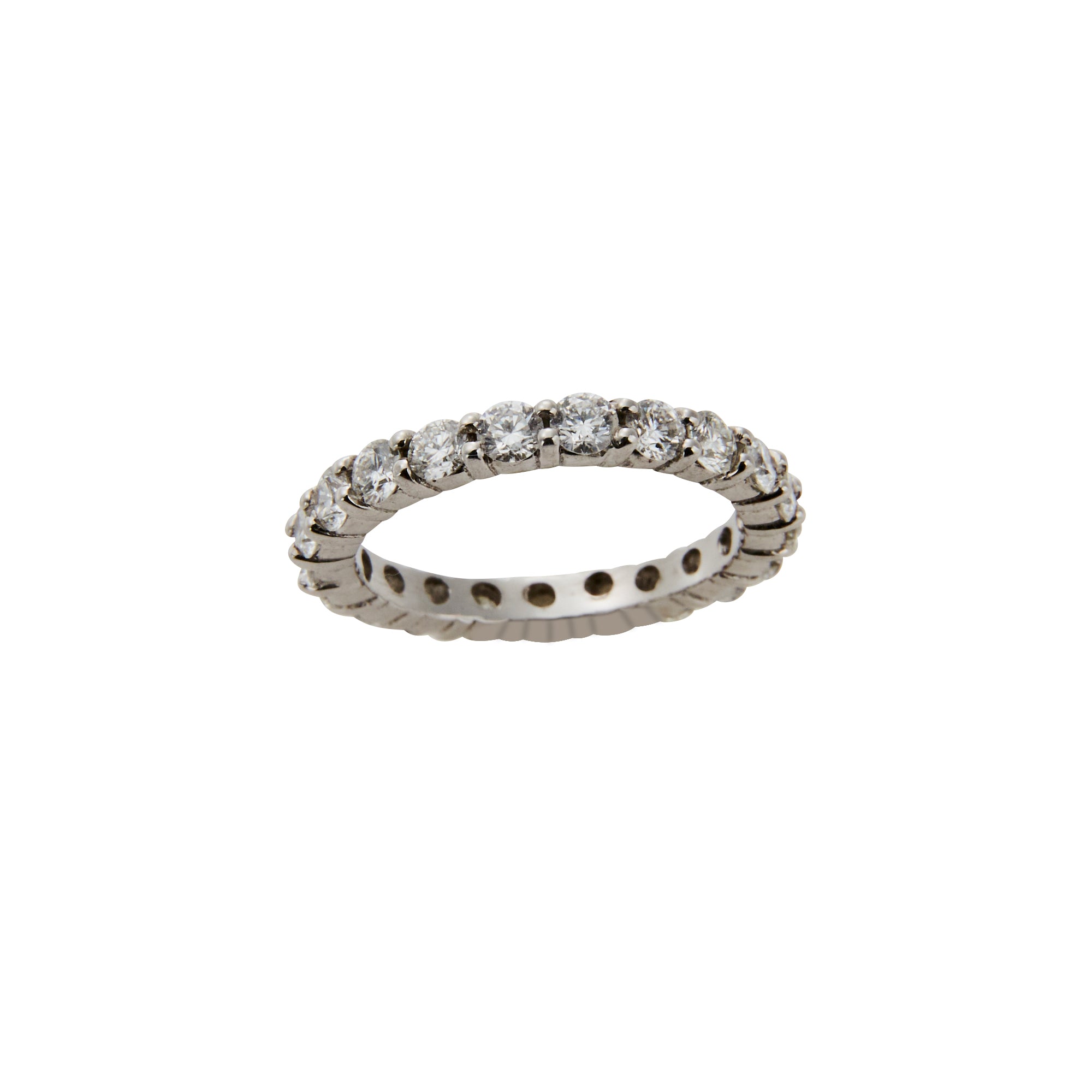 Round diamond eternity bands from Jeuje Fine Jewelry on a white background