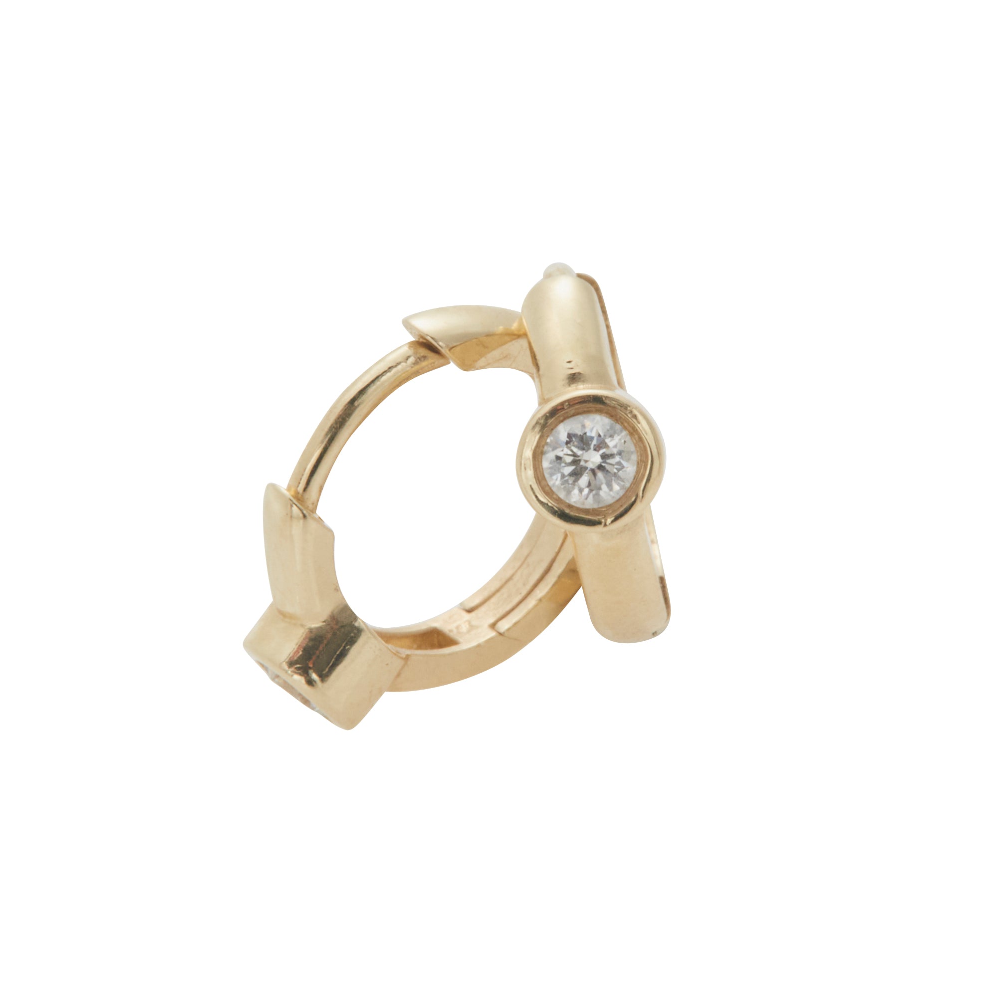 Huggies with a solitaire diamond bezel from Jeuje Fine Jewelry on a white background