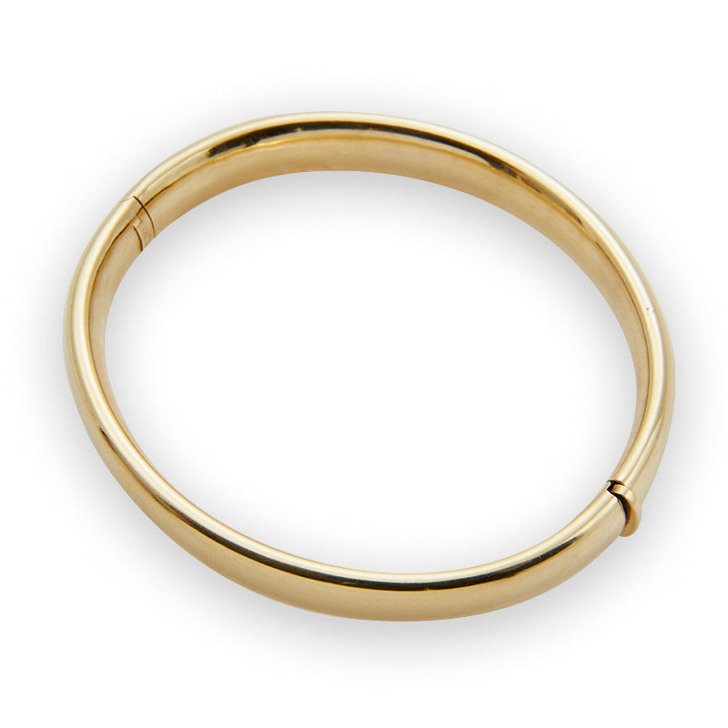 Smooth gold bangle from Jeuje Fine Jewelry on a white background