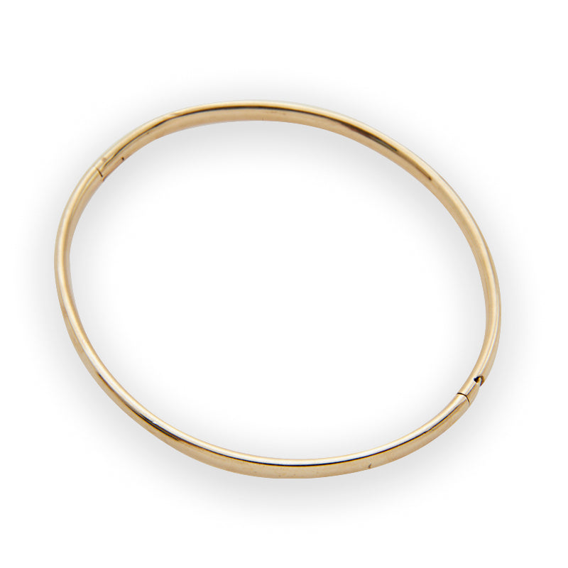 The classic gold bangle from Jeuje Fine Jewelry on a white background