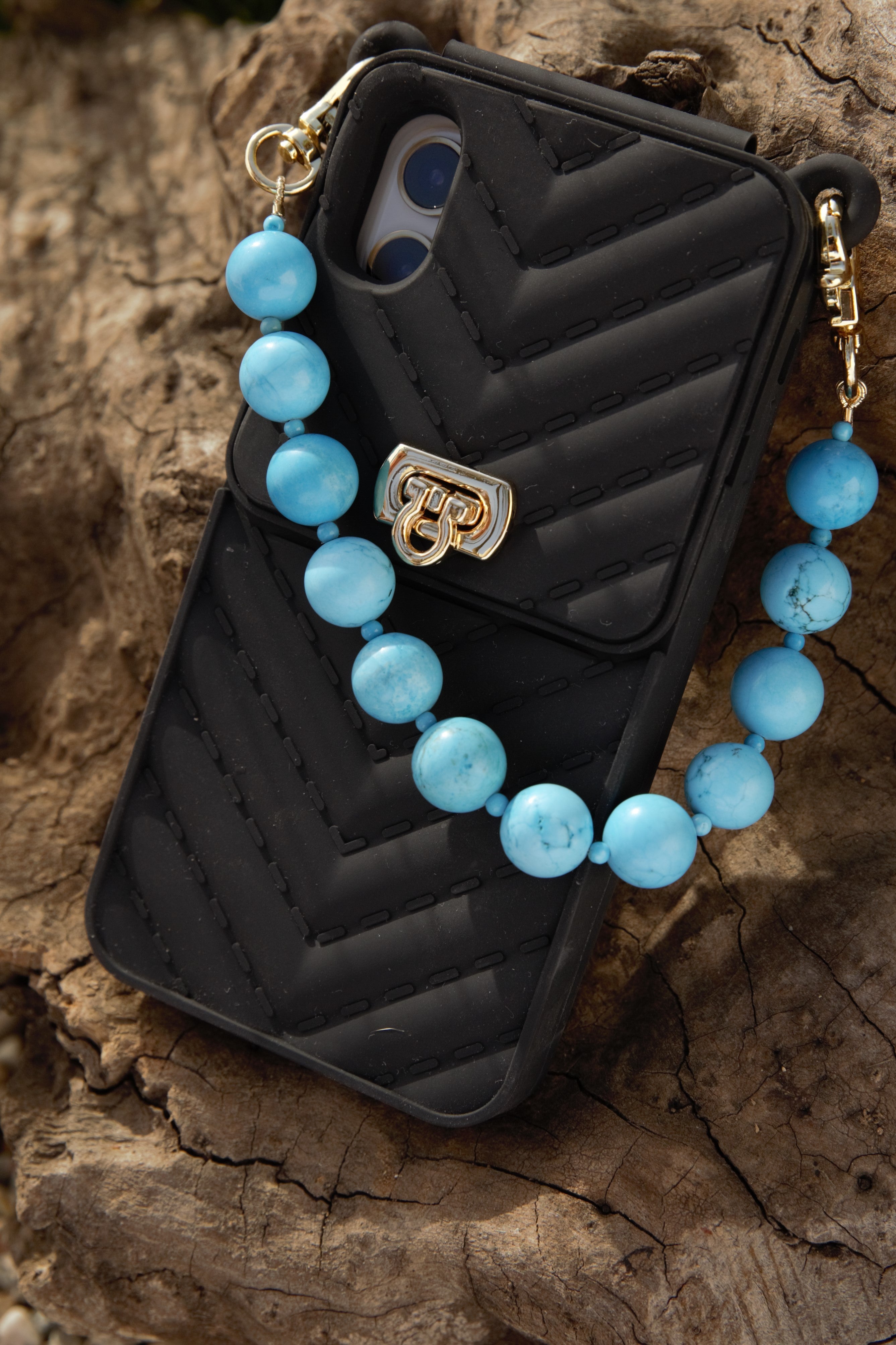 Turquoise wristlet with gold clasps