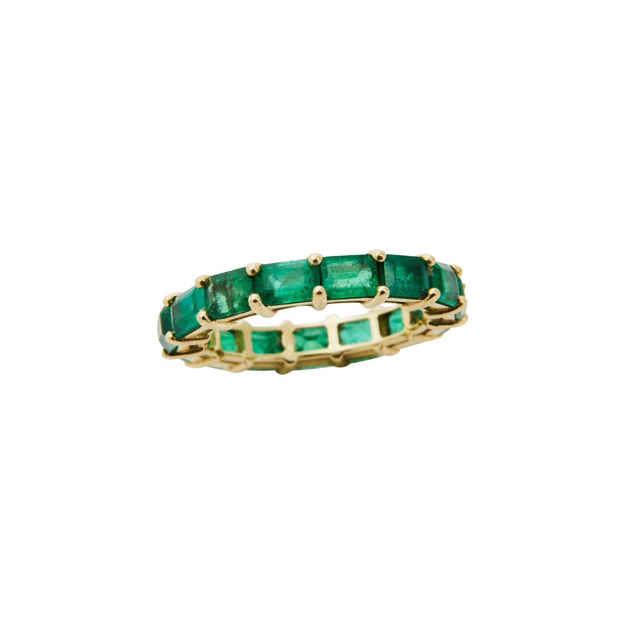 The Emerald Eternity Band from Jeuje Fine Jewelry on a white background