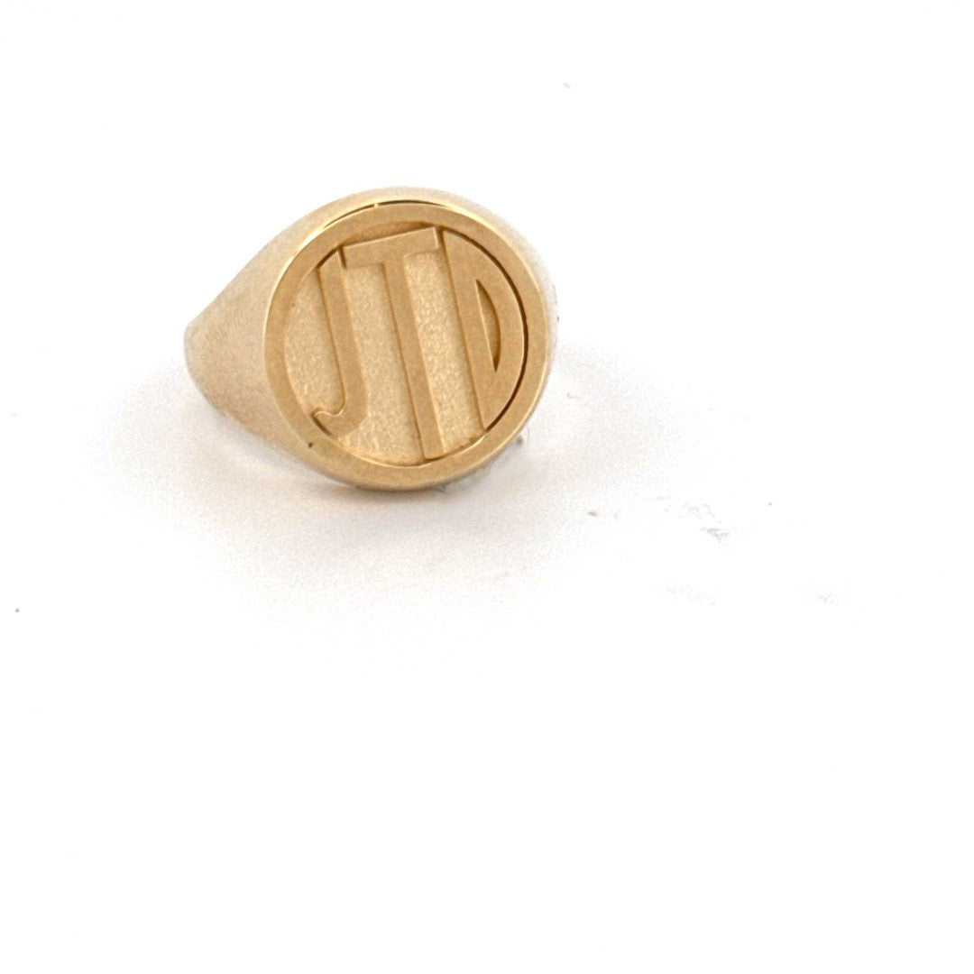 JTD gold ring from Jeuje Jewelry on a white background